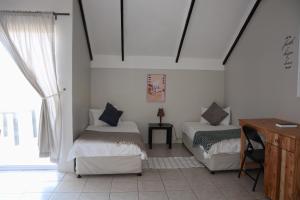 Letto o letti in una camera di Crayfish Creek