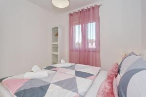 Postel nebo postele na pokoji v ubytování Villa Nivel