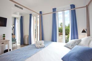 Posteľ alebo postele v izbe v ubytovaní Boutique Hotel Petit Sant Miquel