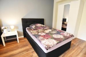 Ein Bett oder Betten in einem Zimmer der Unterkunft Dorya am Ring