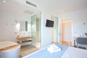 Posteľ alebo postele v izbe v ubytovaní Boutique Hotel Petit Sant Miquel