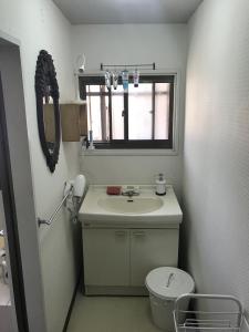 Ванная комната в Guest house & Bar Diamond Head