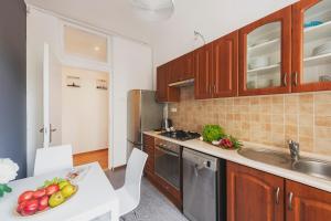 A kitchen or kitchenette at Sandomierska P&O Apartments