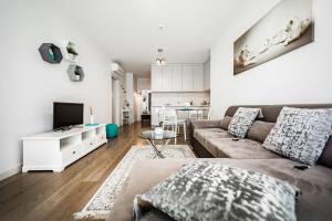 TV a/nebo společenská místnost v ubytování FoRest Apartments