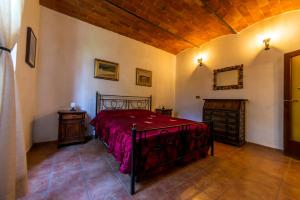 Ένα ή περισσότερα κρεβάτια σε δωμάτιο στο Casa Ruvidi