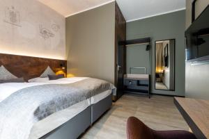 Krevet ili kreveti u jedinici u okviru objekta Boutique Essen City