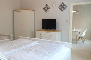 A bed or beds in a room at Apartments Obdach