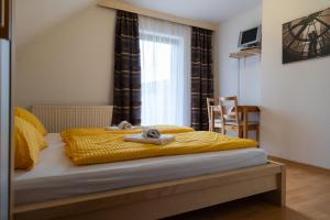 Postel nebo postele na pokoji v ubytování Haus Lebensfreude