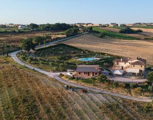 an aerial view of a house in a field at Agriturismo San Silvestro in Marsciano