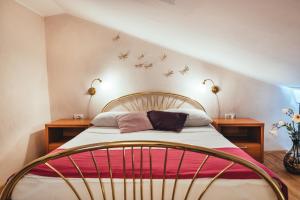 a bedroom with a bed with stars on the wall at Guesthouse Centrum B&B in Izola