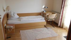 Posteľ alebo postele v izbe v ubytovaní Landhaus Waldfrieden