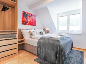 Posteľ alebo postele v izbe v ubytovaní SKY9 Penthouse Apartments