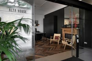 a room with a glass door with a table and chairs at Alta House Begur in Begur