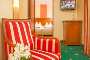 TV a/nebo společenská místnost v ubytování Hotel Wilder Mann