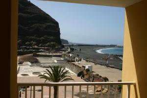 a view of a beach from a balcony at Apartamento Luz y Mar in Tazacorte