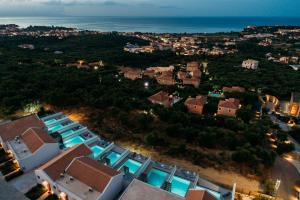 an aerial view of a city with houses at Hotel St.John Suites Adults Only in Tsilivi
