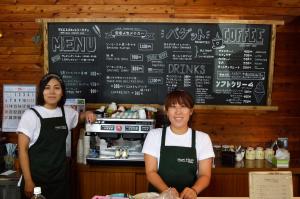 two women are standing in front of a coffee shop at The Yurts at Margo's Garden, Kiroro in Akaigawa
