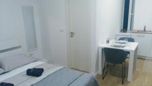 Posteľ alebo postele v izbe v ubytovaní Studio apartman Adris