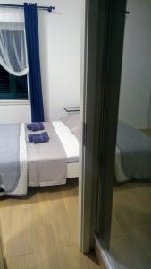 Posteľ alebo postele v izbe v ubytovaní Studio apartman Adris