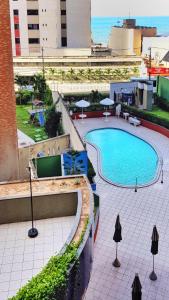 Vista de la piscina de Apartamento Porto de Iracema estilo o d'una piscina que hi ha a prop