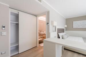 Postel nebo postele na pokoji v ubytování Hotel Vittoria