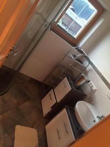a bathroom with a sink and a mirror at Grossummerstall in Mittersill +33 photos