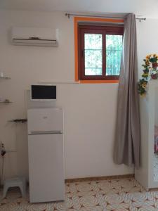 Kuchyň nebo kuchyňský kout v ubytování Casa Vacanza DaRó