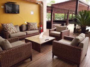 Khu vực ghế ngồi tại Flats Enseada Delphin