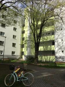 a bike parked in front of a building at Utešené Apartmány - Bratislava - Trnavské mýto in Bratislava