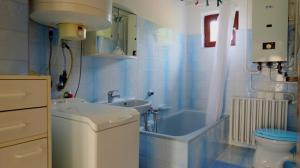 Kúpeľňa v ubytovaní Charlie Vendégház,emelet 8 fős,100m2-es apartman