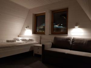Letto o letti in una camera di Tuhamäe hosteli puhkemajad