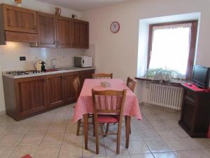 Kuchyň nebo kuchyňský kout v ubytování Residence Du Chateau