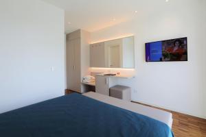 Telewizja i/lub zestaw kina domowego w obiekcie Hotel Simi Lan