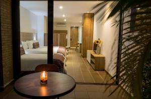 Ένα ή περισσότερα κρεβάτια σε δωμάτιο στο Alko Hotel Integrado