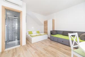 Posteľ alebo postele v izbe v ubytovaní Apartmani Ujdur