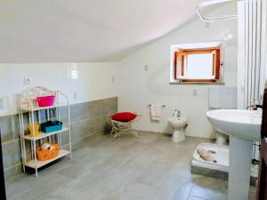 Kúpeľňa v ubytovaní Sui tetti del borgo antico