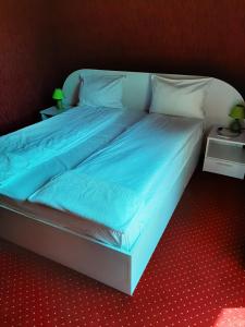 Postel nebo postele na pokoji v ubytování Vila Ana-Maria