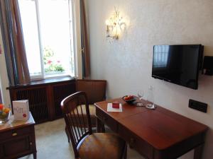 TV a/nebo společenská místnost v ubytování Boutiquehotel Oberkirch im Zentrum