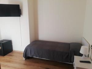 TV a/nebo společenská místnost v ubytování Hotel Porta Del Sole
