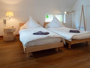 A bed or beds in a room at Gruppenhaus Darmstadt