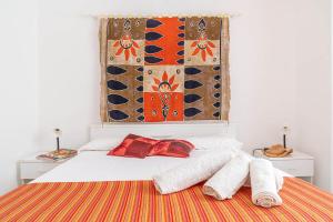 Cama o camas de una habitación en Palms Villa