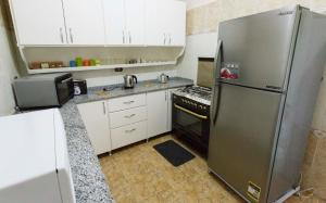 Cucina o angolo cottura di Al Gezera Apartments