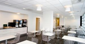 TV a/nebo společenská místnost v ubytování Motel X
