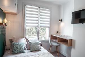 TV a/nebo společenská místnost v ubytování Le joyau de Belledonne