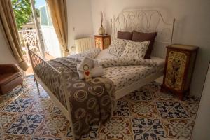 Postel nebo postele na pokoji v ubytování Villa Palmer I Beachhouse