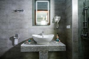 A bathroom at Hotel Makona