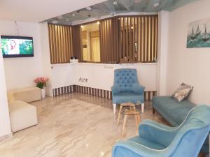 TV a/nebo společenská místnost v ubytování Lunde Sea View Apartment