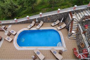 Bazén v ubytování Angela Pool Apartments nebo v jeho okolí