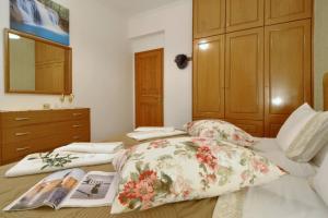 Postel nebo postele na pokoji v ubytování Angela Pool Apartments