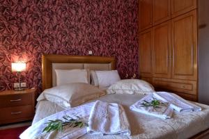 Postel nebo postele na pokoji v ubytování Angela Pool Apartments